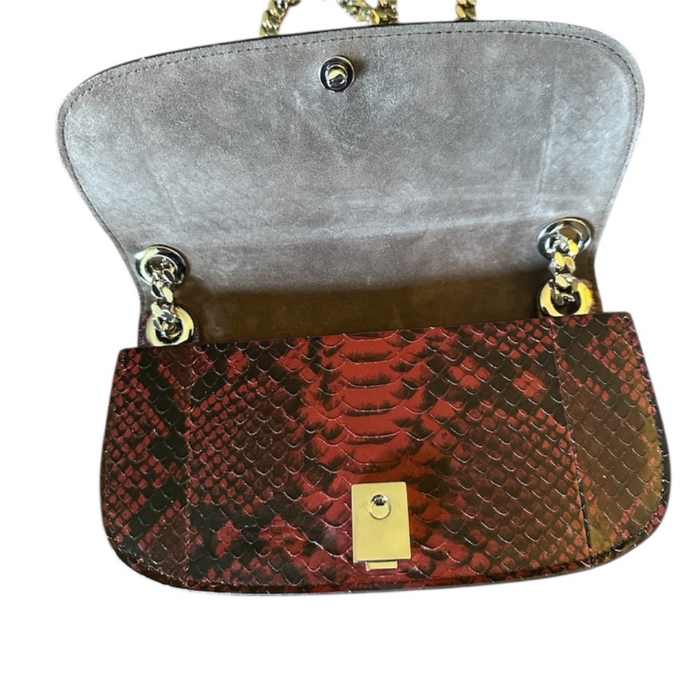 Michael Kors collection runway
CHRISTIE PYTHON EMBOSSED
LEATHER BAG RETAIL 1,090 - Picture 9 of 10